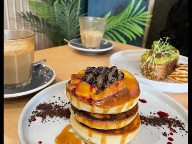 Apple crumble pancake stack / Brekkie pancake stack - bacon, sausage, maple syrup / Kids pancakes with fruit and maple syrup (https://nelsoncoffee.co.uk/pages/the-roastery-station-parade) - photo from Google Maps