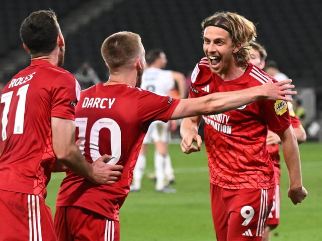 GOAL Crawley Town forward Danilo Orsi (9) scores a goal and celebrates with Crawley Town midfielder Ronan Darcy (10) 1-5 during the EFL Sky Bet League 2 play-off second leg match between Milton Keynes Dons and Crawley Town at stadium:mk, Milton Keynes, England on 11 May 2024.:Crawley Town hammered MK Dons 5-1 - and 8-1 on aggregate - to reach the League Two play-off final Wembley. Photographer Dennis Goodwin/Pro Sport Images was there to catch the action, the crowd and the celebrations