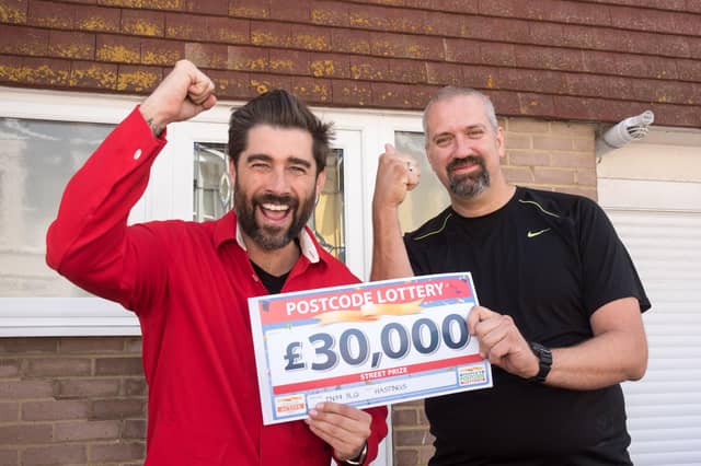 Steven Demeza, right, with Postcode Lottery ambassador Matt Johnson, left