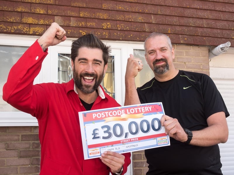 Steven Demeza, right, with Postcode Lottery ambassador Matt Johnson, left