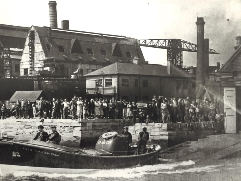 Poole lifeboat Thomas Kirk Wright being launched down the slipway at the old Poole lifeboat station, now a museum