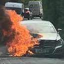 A car was engulfed in flames in Ditchling this afternoon (Friday, April 5). Photo: Liz Dowsett