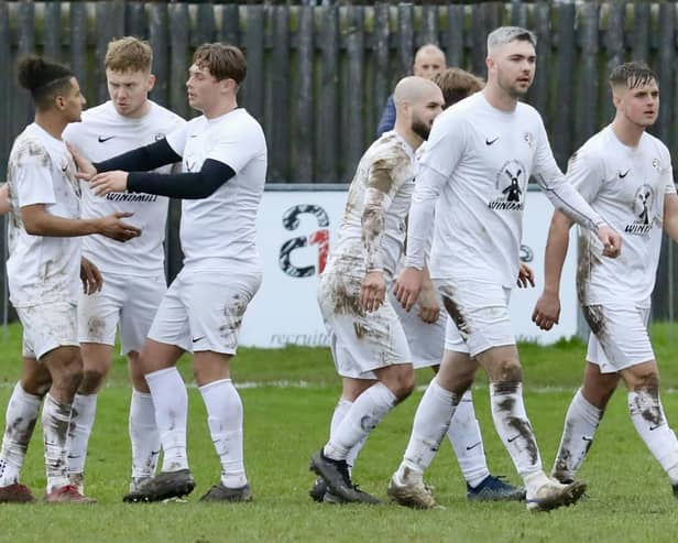 Eastboune United celebrate the breakthrough against Peacehaven and Telscombe | Picture: Joe Knight