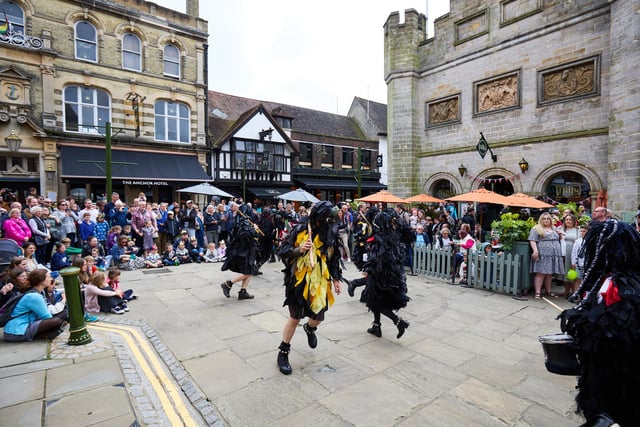 Mythago dancers put on a lively display in Horsham's Market Square. Photo: Toby Phillips Photography