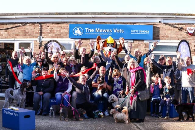 Celebrating the opening of The Mewes Vets, Peacehaven with a ribbon cut by author Lynne Truss