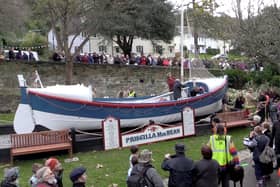 The Priscilla MacBean lifeboat showing the large sign that has been stolen
