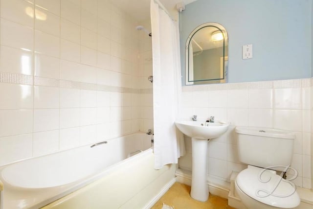 The family bathroom, which is on the first floor, comes complete with a panelled bath, full-height tiling, pedestal sink, low-flush WC and an opaque window to the back of the house.