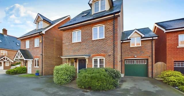 This stylish four-bedroom property is arranged over three floors. It is in a quiet cul-de-sac in Broadbridge Heath and is on sale with offers invited over £575,000