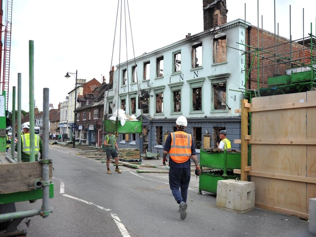 Scaffolding work has started on the Angel Inn in Midhurst. Pic S Robards SR2305311