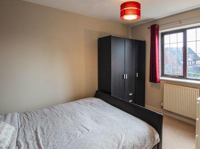 This is the second bedroom, which is only slightly smaller than the master and overlooks the front of the house. As you can see, there is pace for a sizeable wardrobe and a chest of drawers.