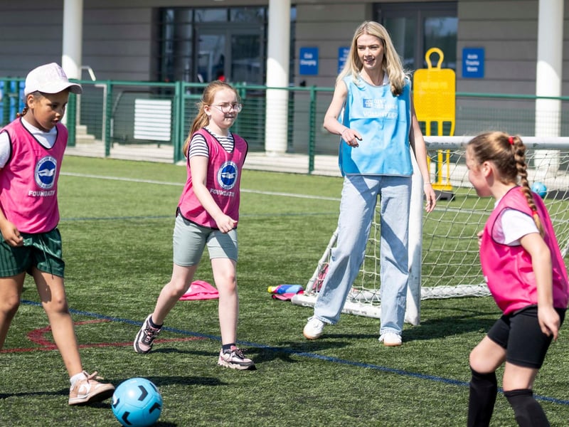 The girls took part in a carousel of football related challenges supported by Amex volunteers