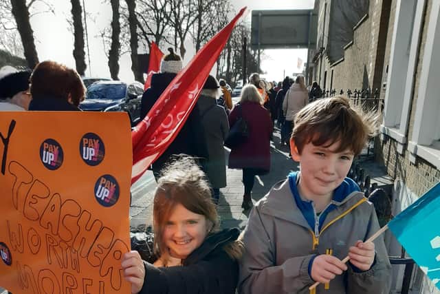 Chesswood Junior School pupils Rufus Bourner and Ophelia Grantham joined their parents to champion better pay and conditions for their teachers