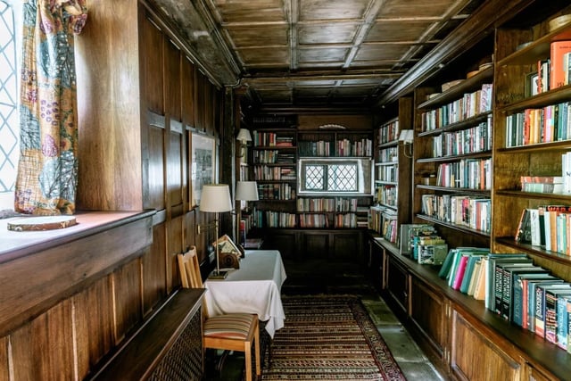 Off the drawing room is a panelled library