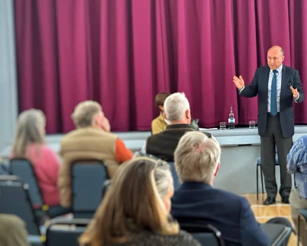 Andrew Griffith speaking to residents in West Chiltington last week.
