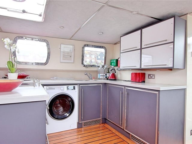 This stunning seafaring Dutch barge houseboat on a private mooring on the River Arun has come on the market with Michael Jones Estate Agents with a guide price of £275,000