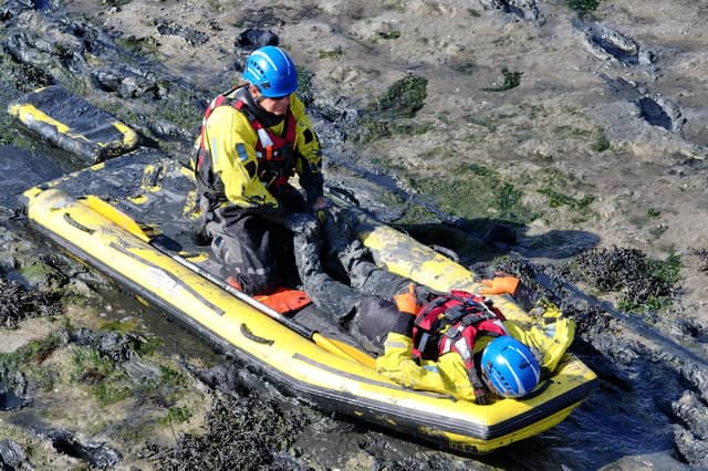 Both agencies worked together to rescue casualties from mud.