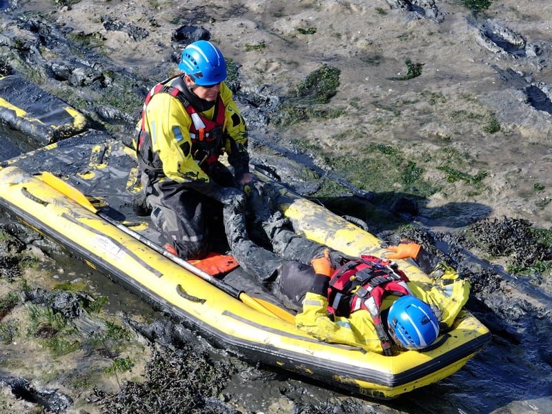 Both agencies worked together to rescue casualties from mud.