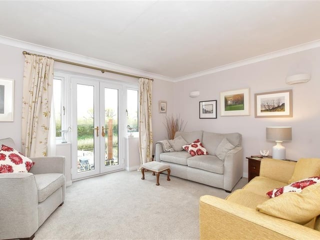 This modern town house with waterside garden is tucked away on a desirable private development in the heart of Arundel. It comes to the market with Cubitt & West, priced at £700,000.