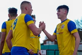 Callum Barlow and Ollie Davies - the two Eastbourne Town scorers - converge after Davies' goal | Picture: Josh Claxton