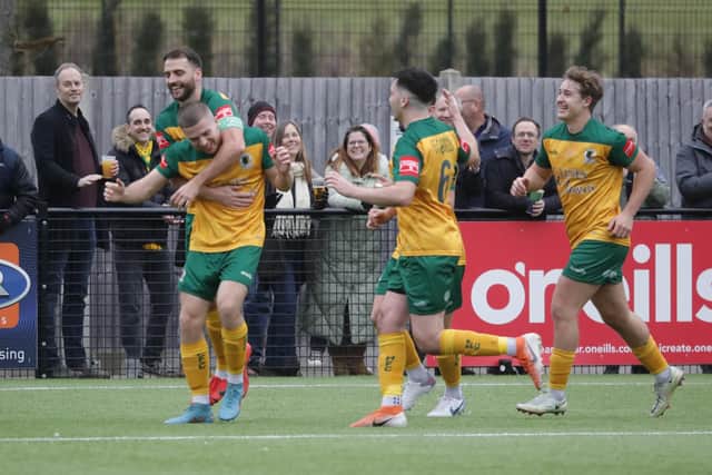 Harvey Sparks is mobbed by his team-mates after putting Horsham ahead in Saturday's defeat to Folkestone Invicta