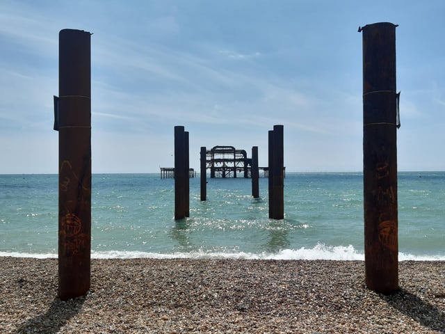 See the ruins of the West Pier