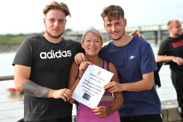 Veronica Sullivan with Toby and Jack Lydon-Gardiner, the sons of her late friend Louise Lydon-James, who died last year from cancer. Pic S Robards SR2210221