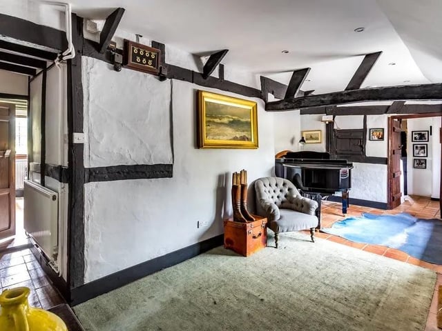 The property has many classic period features like exposed beams and whitewashed plaster walls, wood panelled latched doors and iron framed windows.