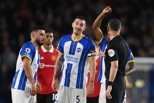 Brighton and Hove Albion skipper Lewis Dunk has a word with the referee against Manchester United at the Amex Stadium last night