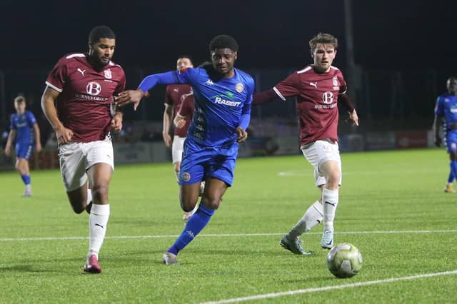 Action between Worthing and Hastings United in the Sussex Senior Cup semi-final at Lancing