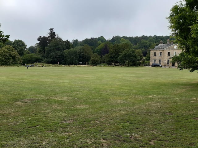 Then go diagonally across the grass, with Stanmer House on your right.