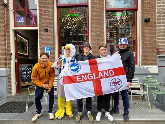 The wet weather failed to dampen spirits as Brighton fans made their presence known in Amsterdam before Albion faced Ajax at the Johan Cruyff Arena. Photo: Sussex World