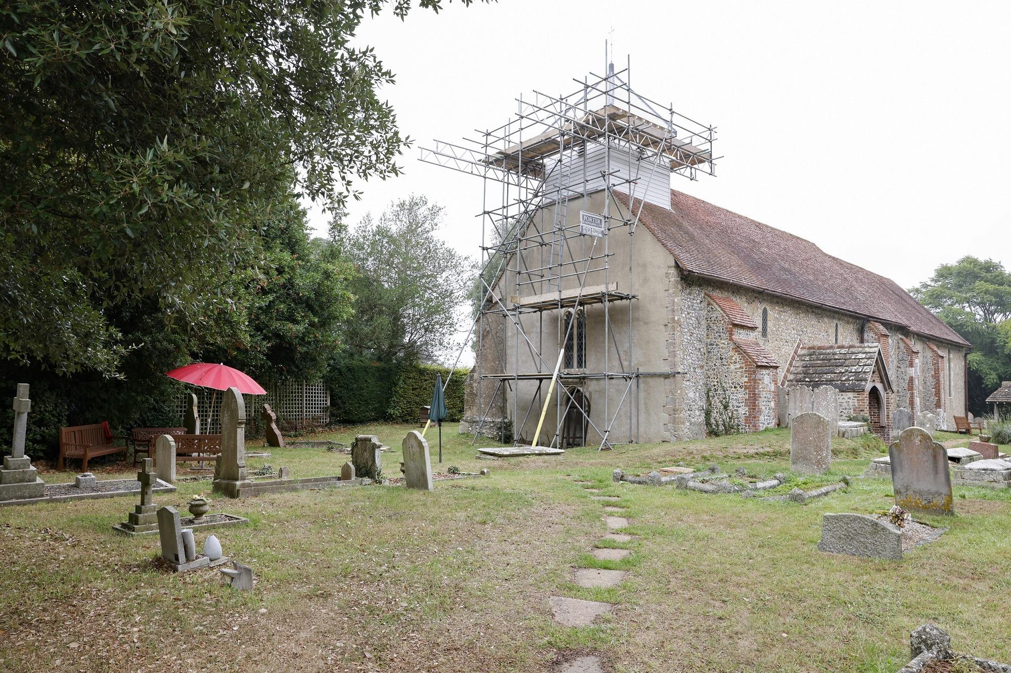 Homebuilder donates £,1000 to historic Barnham church's extension