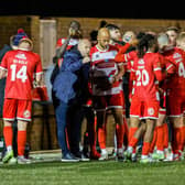 Eastbourne Borough players get their instructions at Priory Lane | Picture: Lydia Redman