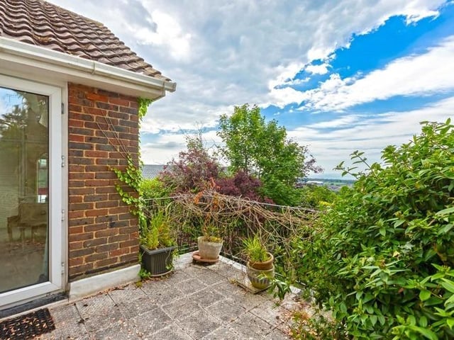 This substantial detached family house sits on the highest point in North Lancing, with grounds totalling 0.5 acres of land. Offers in the region of £1million are invited for this four-bedroom property at the foot of the South Downs National Park, with magnificent panoramic coastal views.