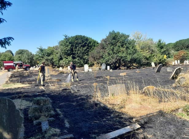 The fire at Broadwater Cemetery, which 'spread to the size of almost two football pitches', is believed to have been started when parched grass was ignited through a discarded piece of glass. Photo: Worthing Borough Council