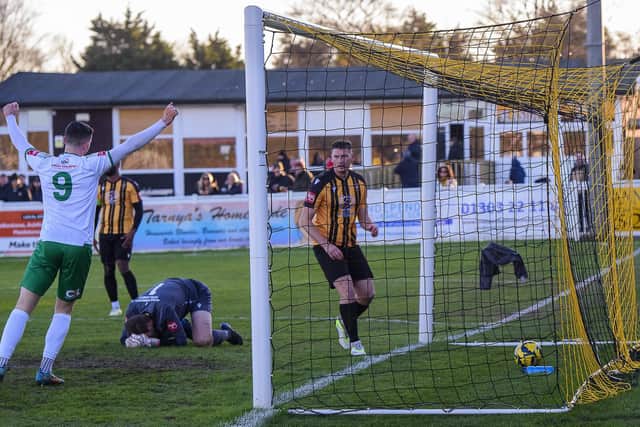 It's in - Jasper Mather, unsighted, has put the Rocks ahead at Folkestone - and it was to be the only goal | Picture: Tommy McMillan