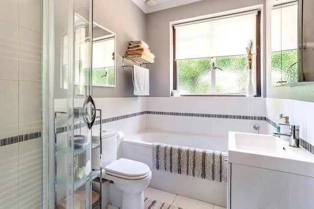 An outstanding family bathroom with a shower