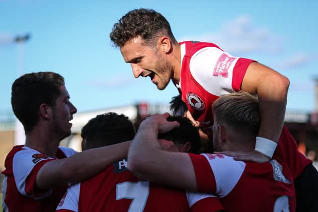 Eastbourne players celebrate on their five goals against Weymouth | Picture: Andy Pelling