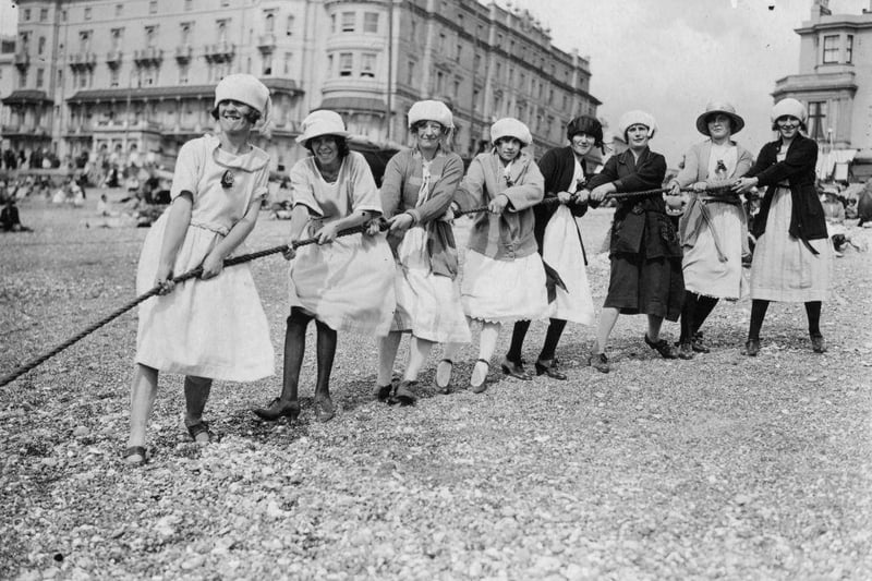 September 1923:  Fun and games on the beach at Hastings during an outing from Ticklers' jam factory,