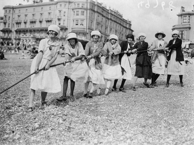 September 1923: Fun and games on the beach at Hastings during an outing from Ticklers' jam factory,