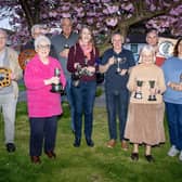 Littlehampton and District Camera Club's 2022/3 season competition winners with their trophies. Picture: David Leighton / Submitted