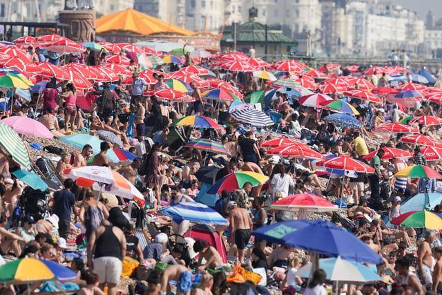 Thousands of people flocked to Brighton beach today (September 9) as temperatures reached 32C across parts of the county.