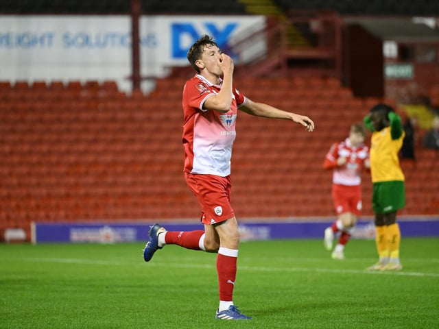 Mael de Gevigney of Barnsley celebrates his goal to make it 3-2 during the Emirates FA Cup First Round match between Barnsley and Horsham at Oakwell Stadium.