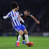 BRIGHTON, ENGLAND - NOVEMBER 06: Miguel Almiron of Newcastle United is tackled by Marc Cucurella of Brighton & Hove Albion during the Premier League match between Brighton & Hove Albion and Newcastle United at American Express Community Stadium on November 06, 2021 in Brighton, England. (Photo by Catherine Ivill/Getty Images)