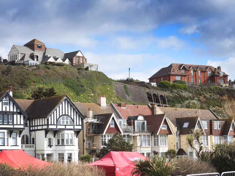 View of the old Eversfield Chest Hospital (building on the left at the top of the cliff) and to the right of it is the old Gambier House building.