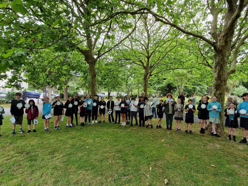 Pupils from Bramber and Homefield primary schools with the personal wreaths they made for the 23 Worthing men who lost their lives