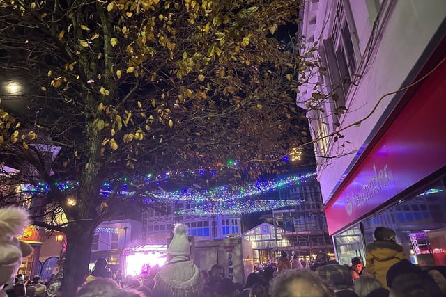 Visitors watch as the lights are switched on.
