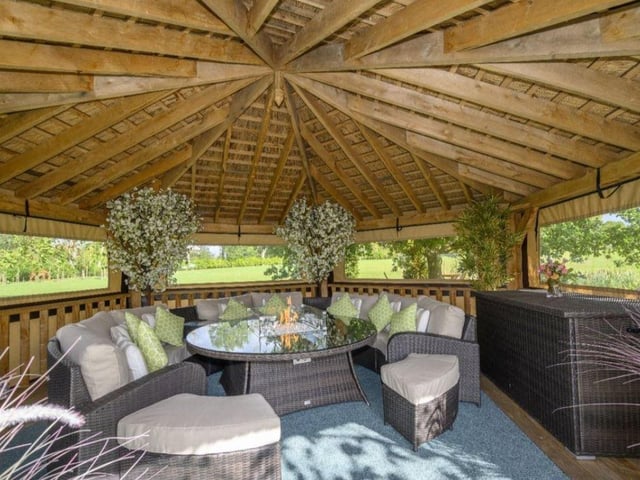 The gardens include a delightful summer house