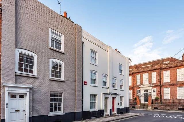 The property is situated in the town centre, close to local schools, shops and the railway station.