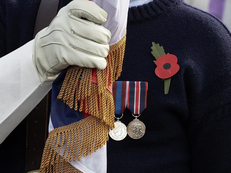 A standard bearer at the Selsey Remembrance Service at St. Peter's Church.
